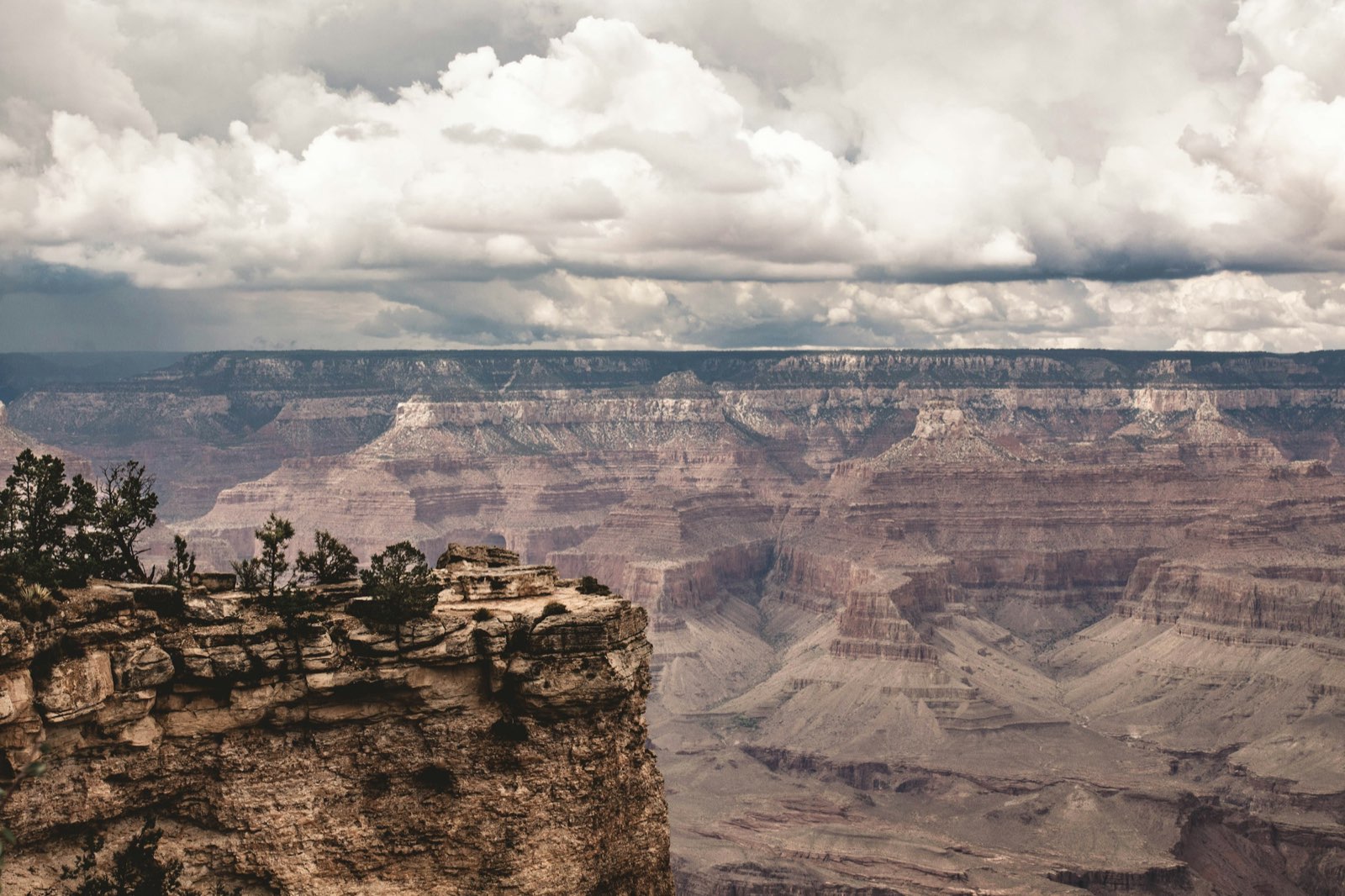 Mather Point on the Grand Canyon South Rim under storm clouds